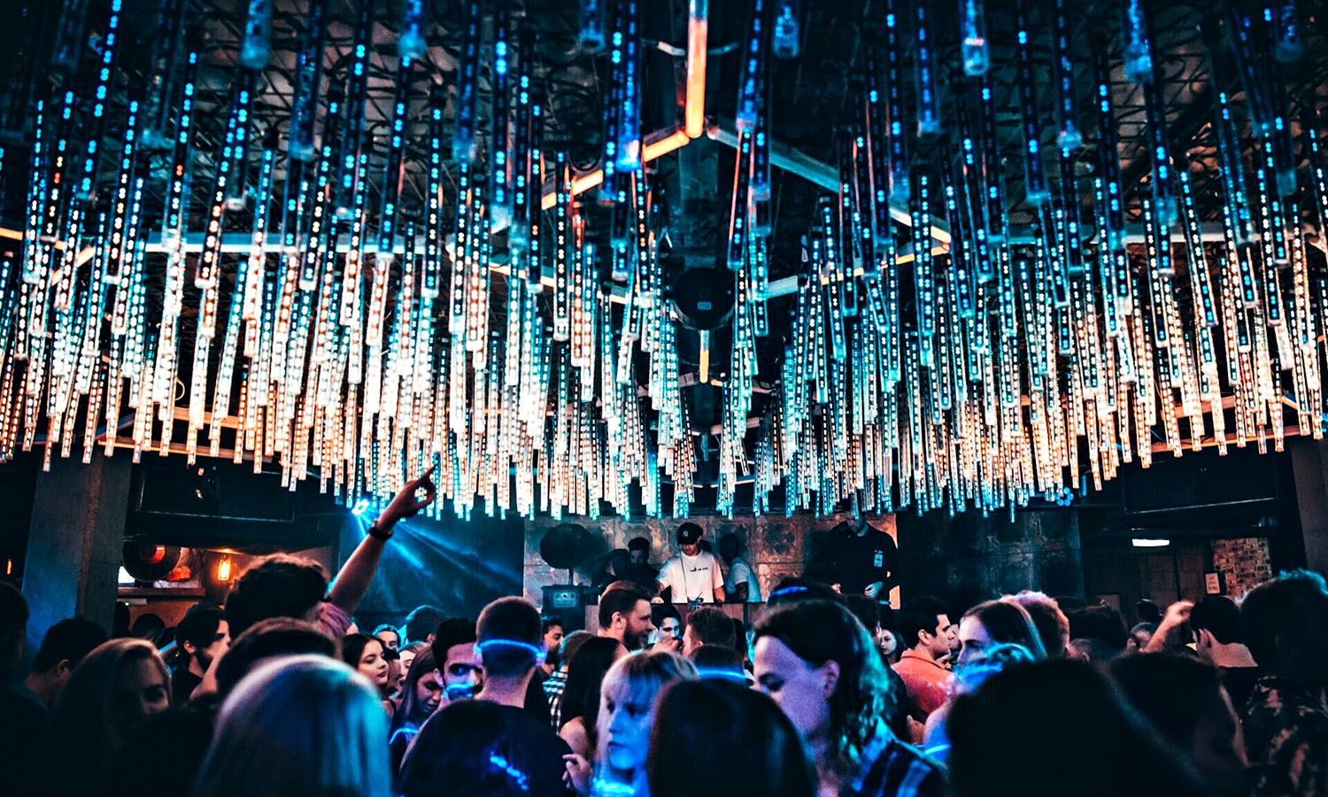 The glittering, neon lights of Prohibition's ceiling as people dance underneath it.