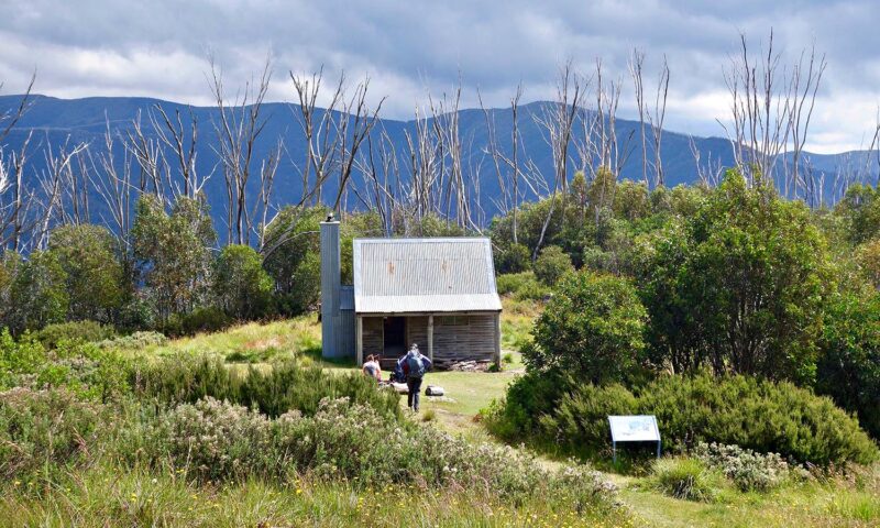 Travellers exploring the secluded Westons Hut in Victoria's High Country.