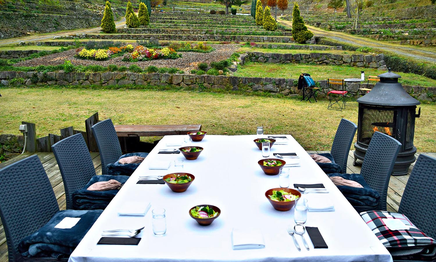 A fully made up table in a Japanese garden