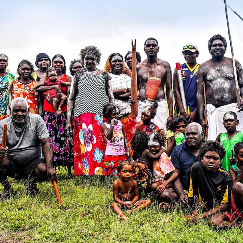 A group of people, some in traditional dress, from the Dhalinbuy community.