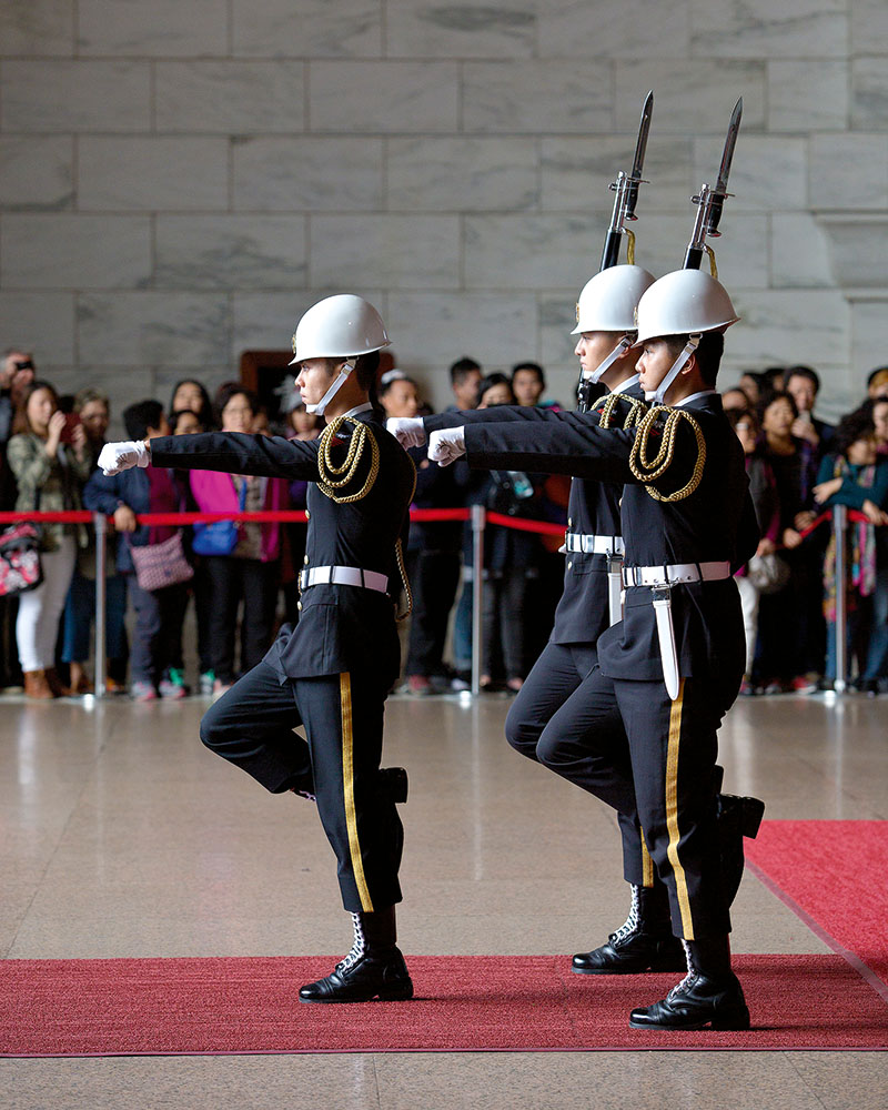 A group of soldiers marching in an official ceremony in Taipei.