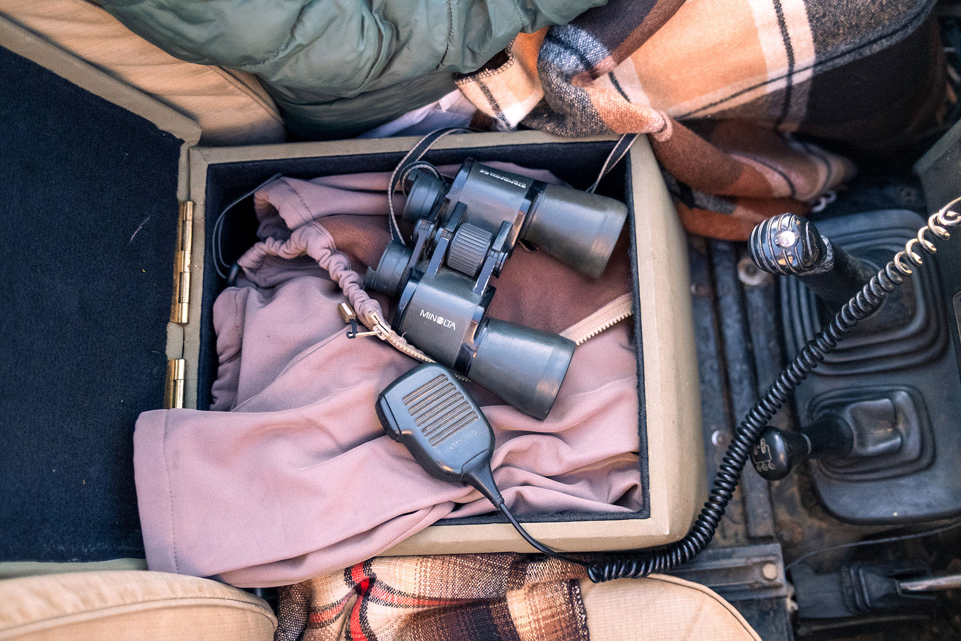 Binoculars and radio, a ranger's tools.