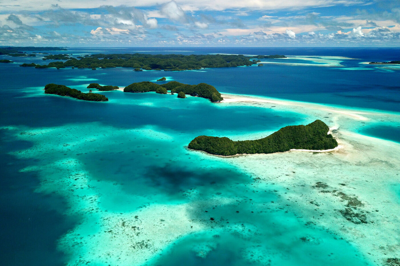 A few islands surrounded by turquoise water in Mozambique.