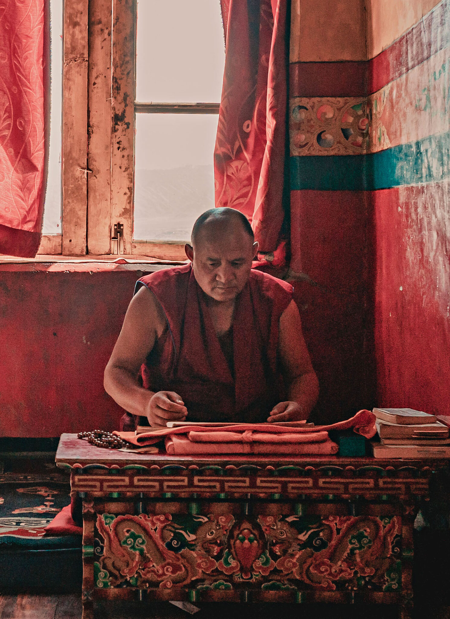 One monk, meditating. 