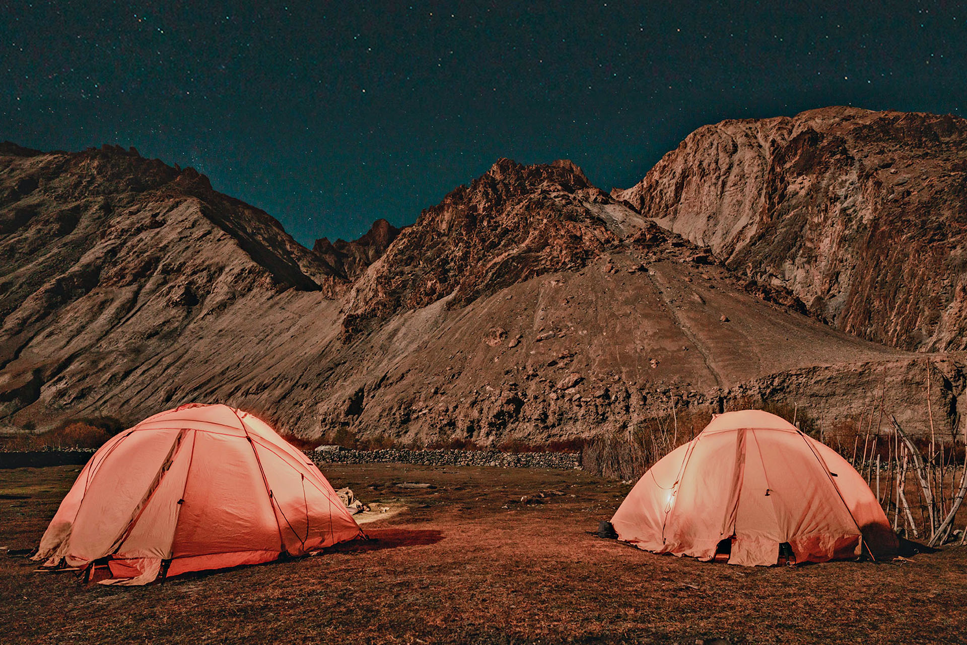 Two coloured tents sit at the foot of part of the Ladakh Ranges under a starry sky in Kathmandu.