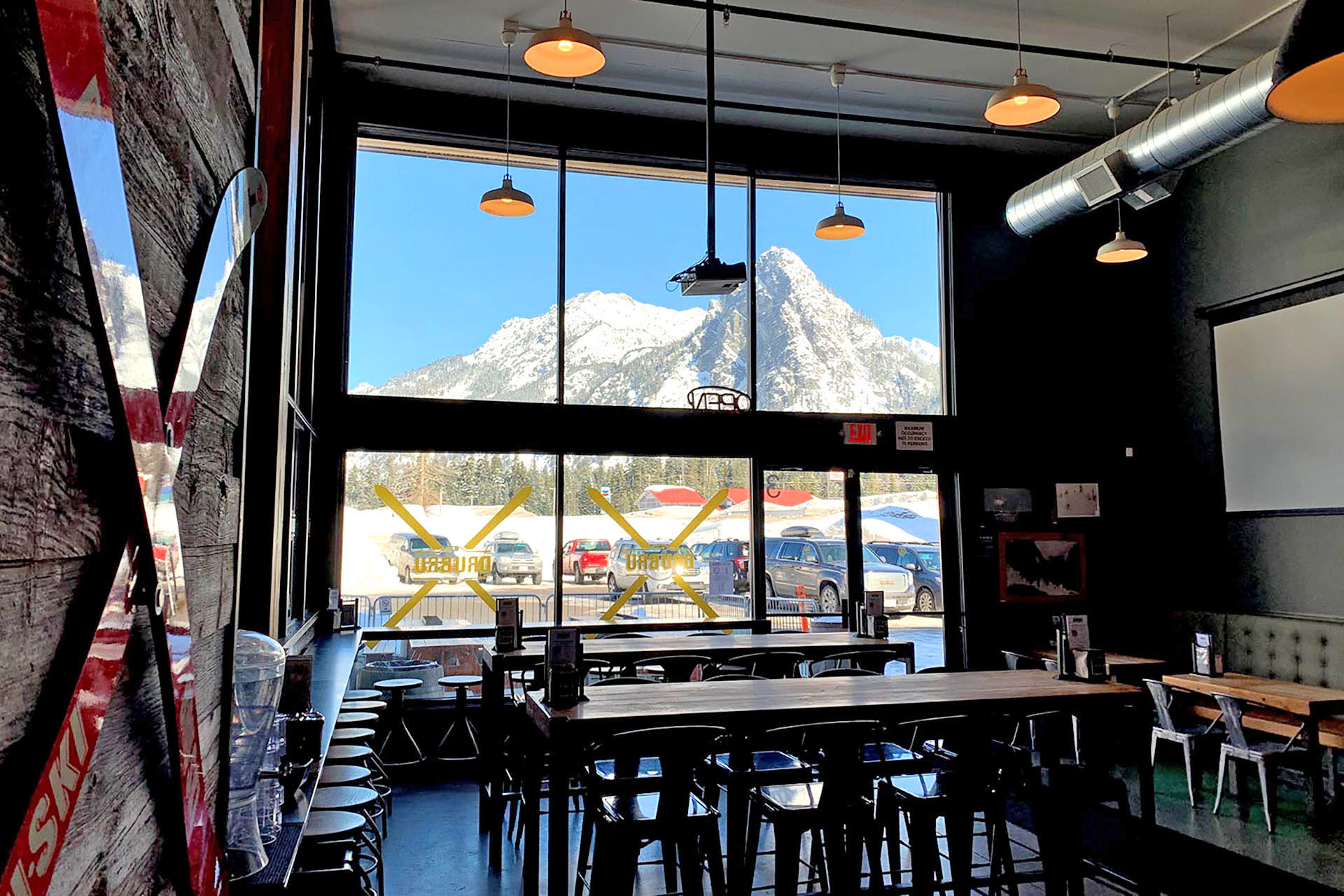 Tables and chairs inside the main area of DruBru in Snoqualmie Pass in Washington.