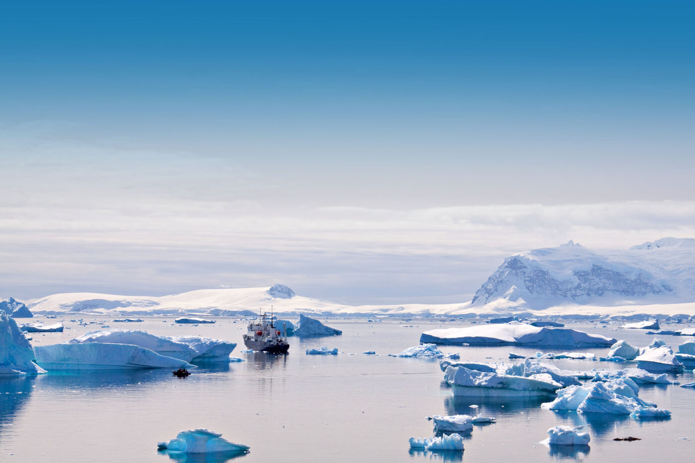 Expedition cruise ship sailing through Antarctica.