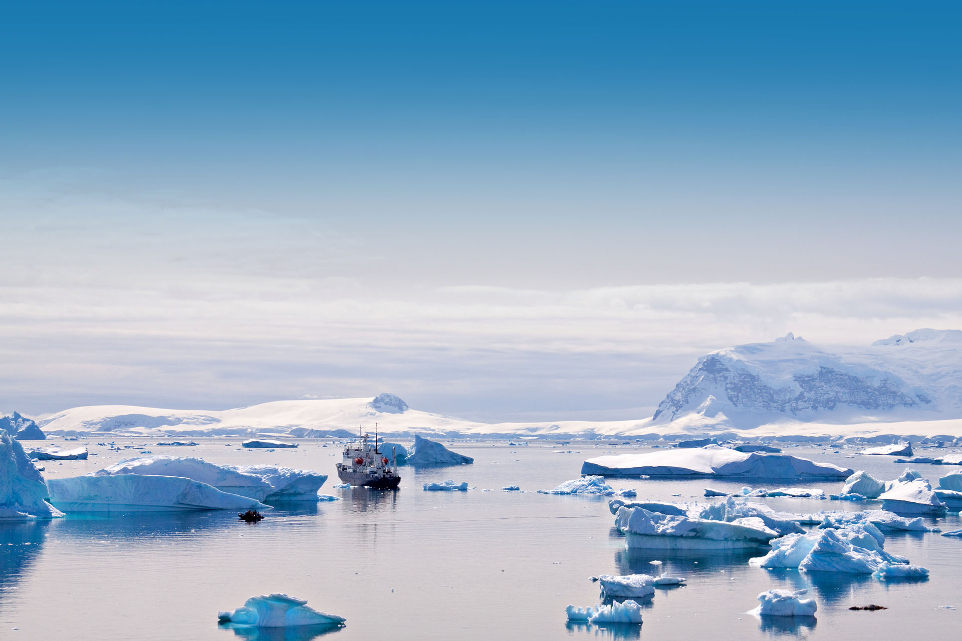 Expedition cruise ship sailing through Antarctica.