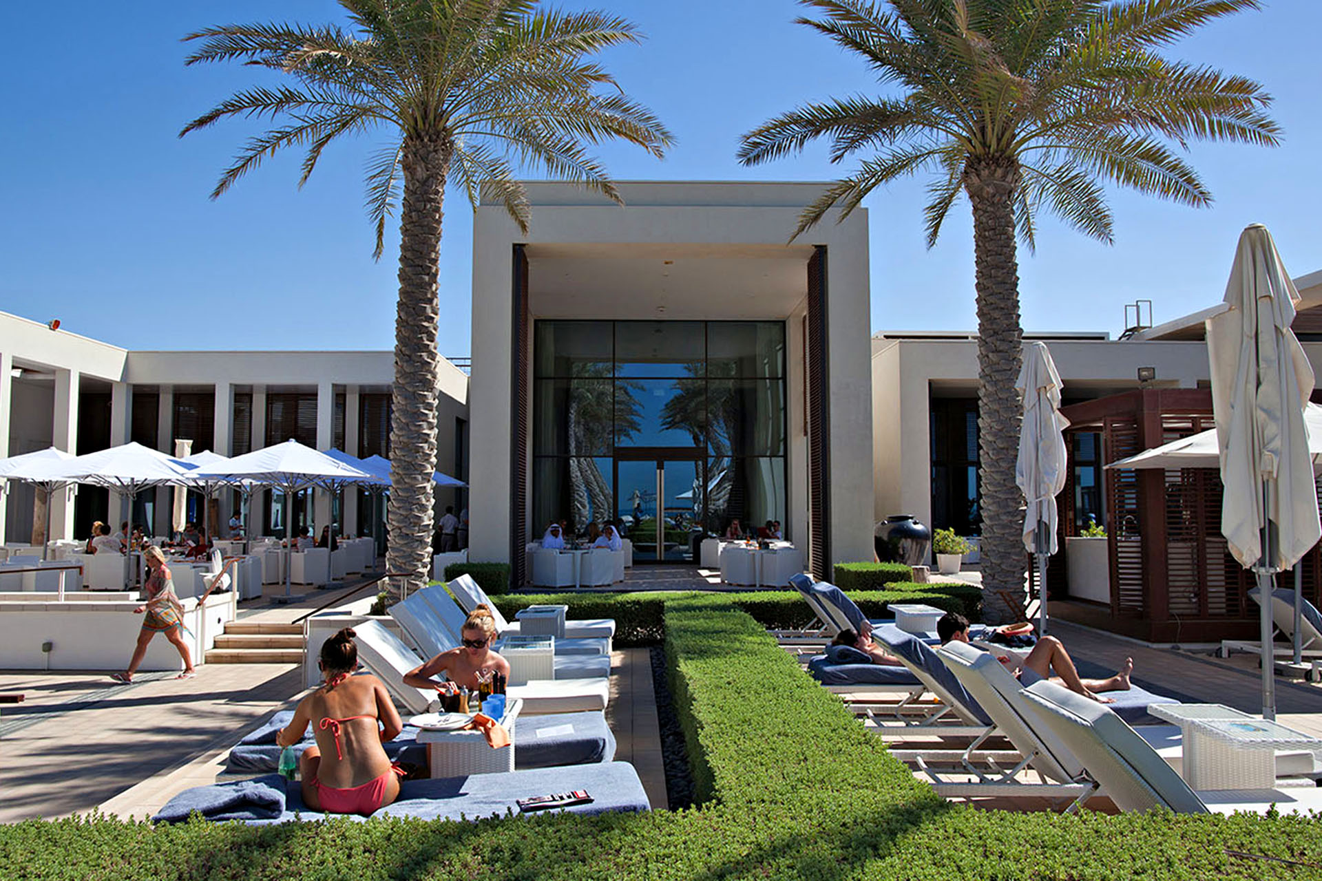 Relaxing by the pool at Saadiyat Beach Club.