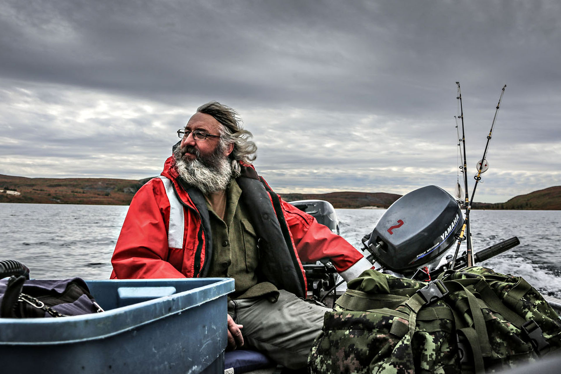 A knowledgeable guide navigates across Peterson’s Point Lake while watching for wildlife.