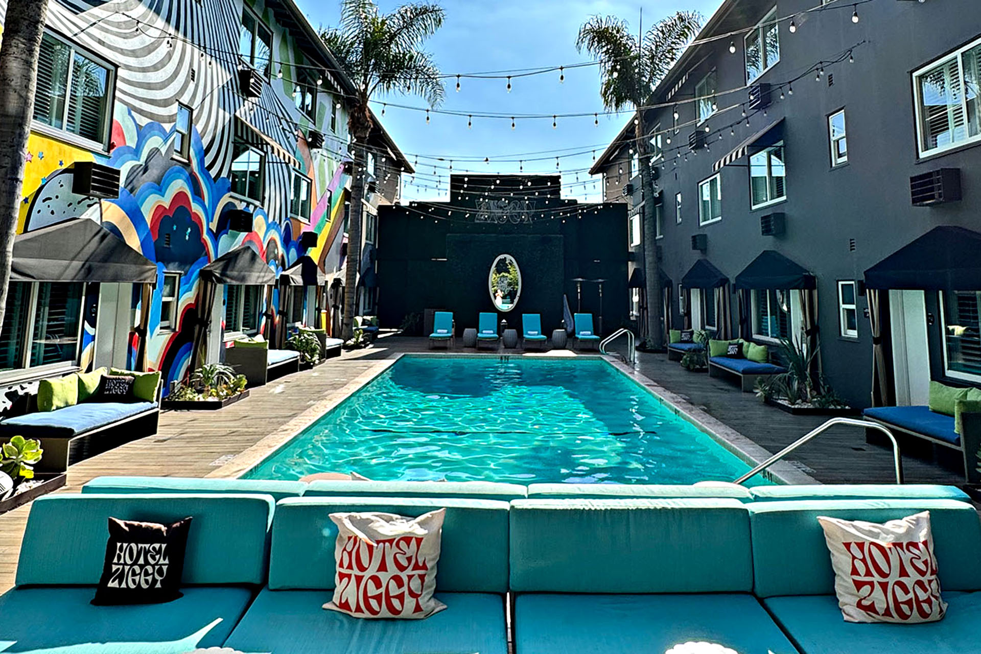 Pool, fairy lights and palm trees. Yes.