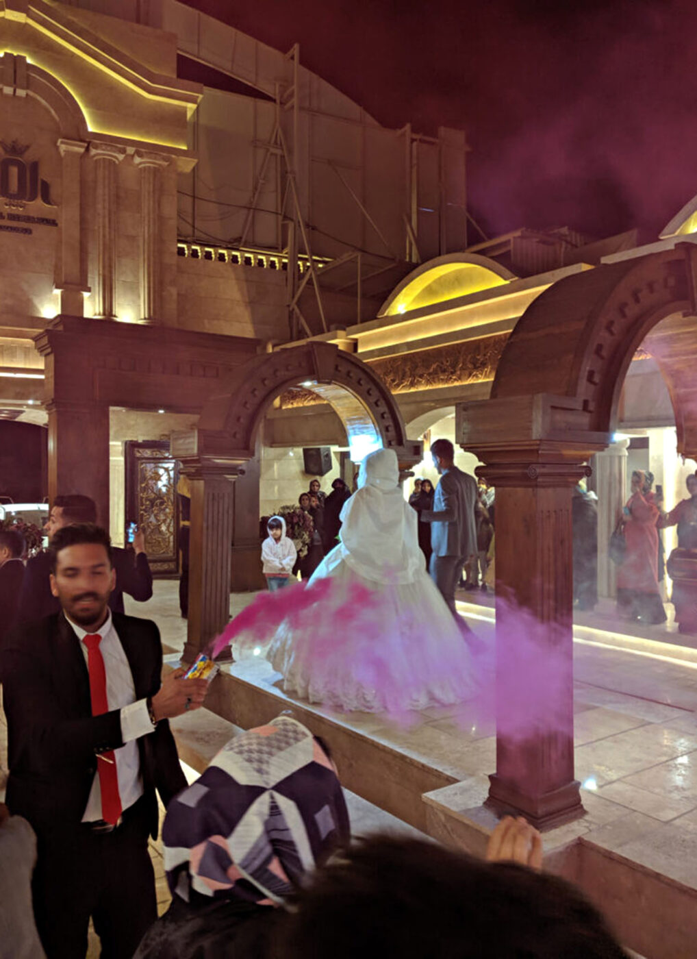 Women and men split into two seperate rooms after the walk down the aisle.