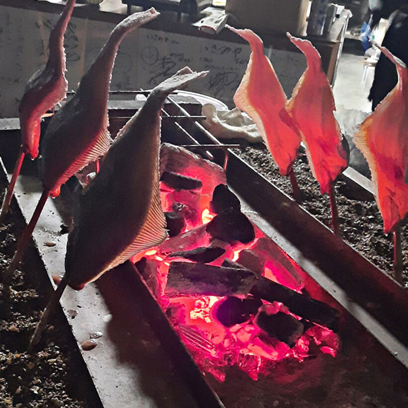 Fresh seafood is grilled over charcoal.