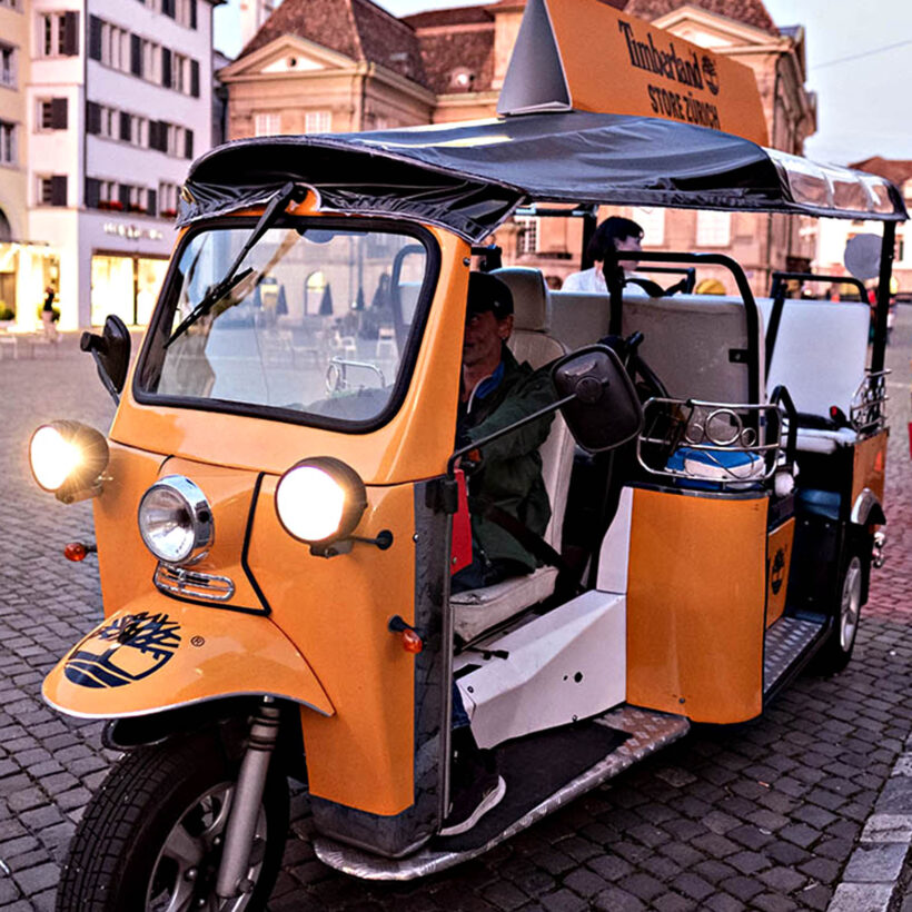 Zurich Old Town viewed from an electric tuk tuk fondue tour.