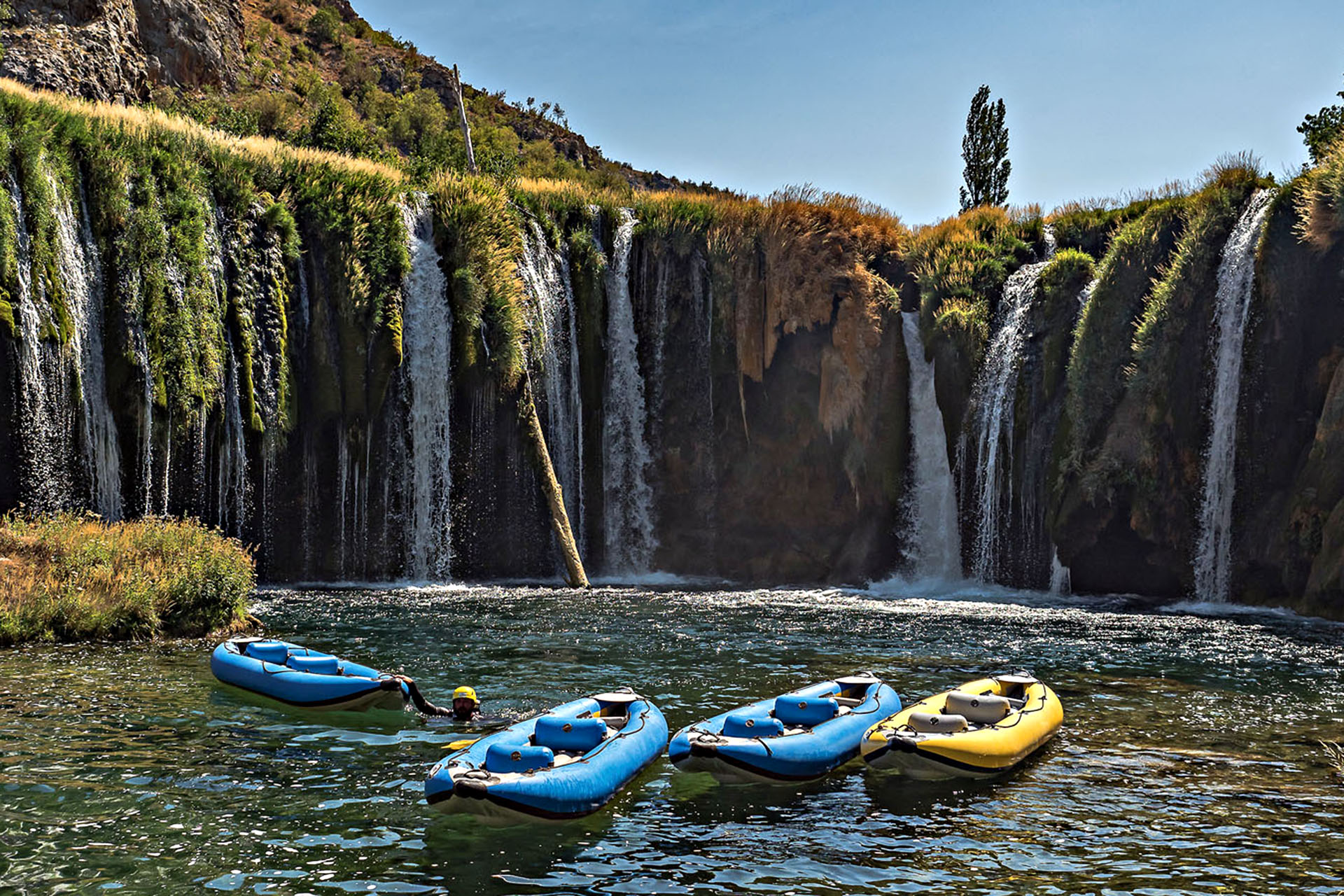 Kayaks ready and waiting to continue downstream at the bottom of Visoki Buk waterfall.