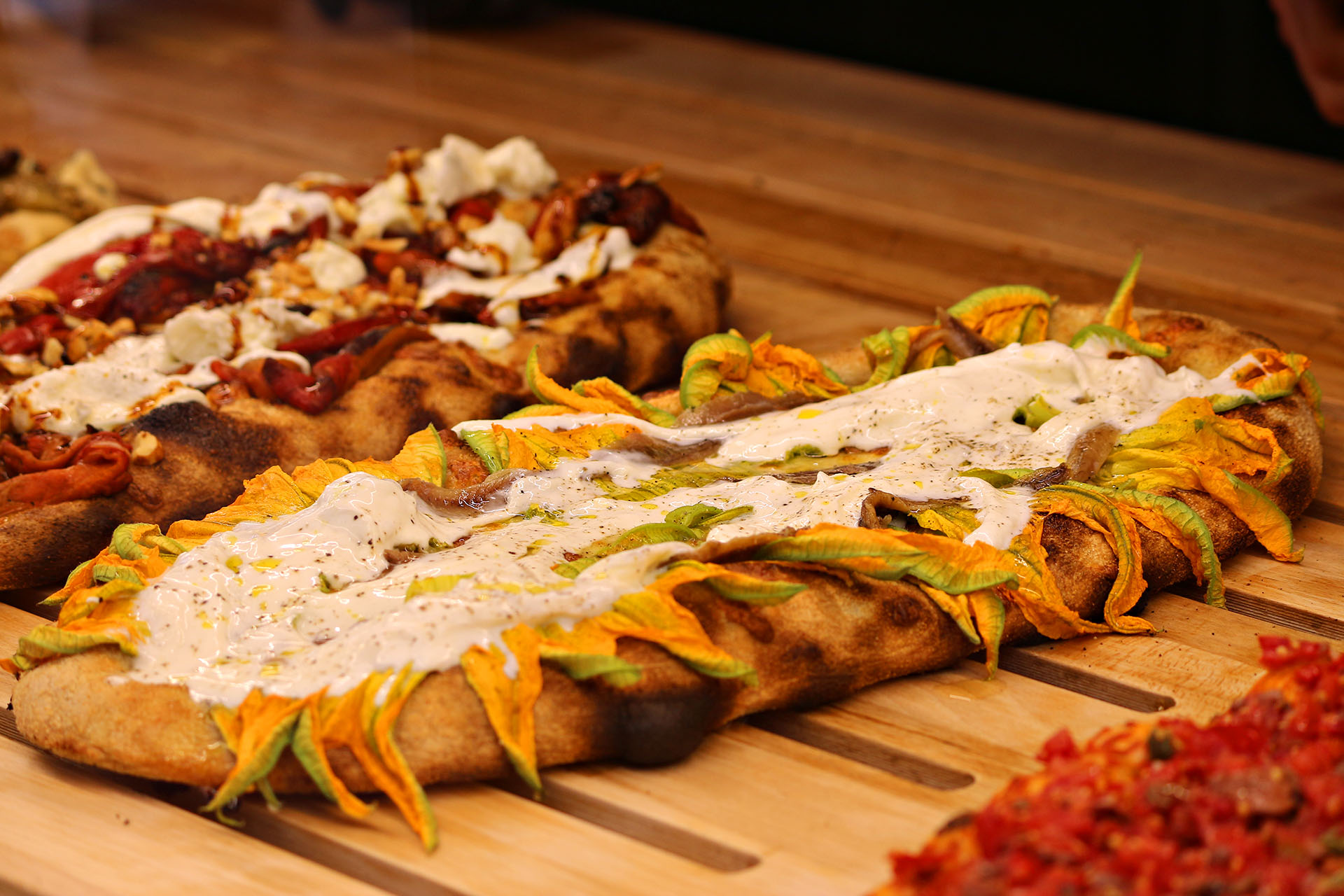 CasaManco’s pizzas with both traditional and more contemporary toppings