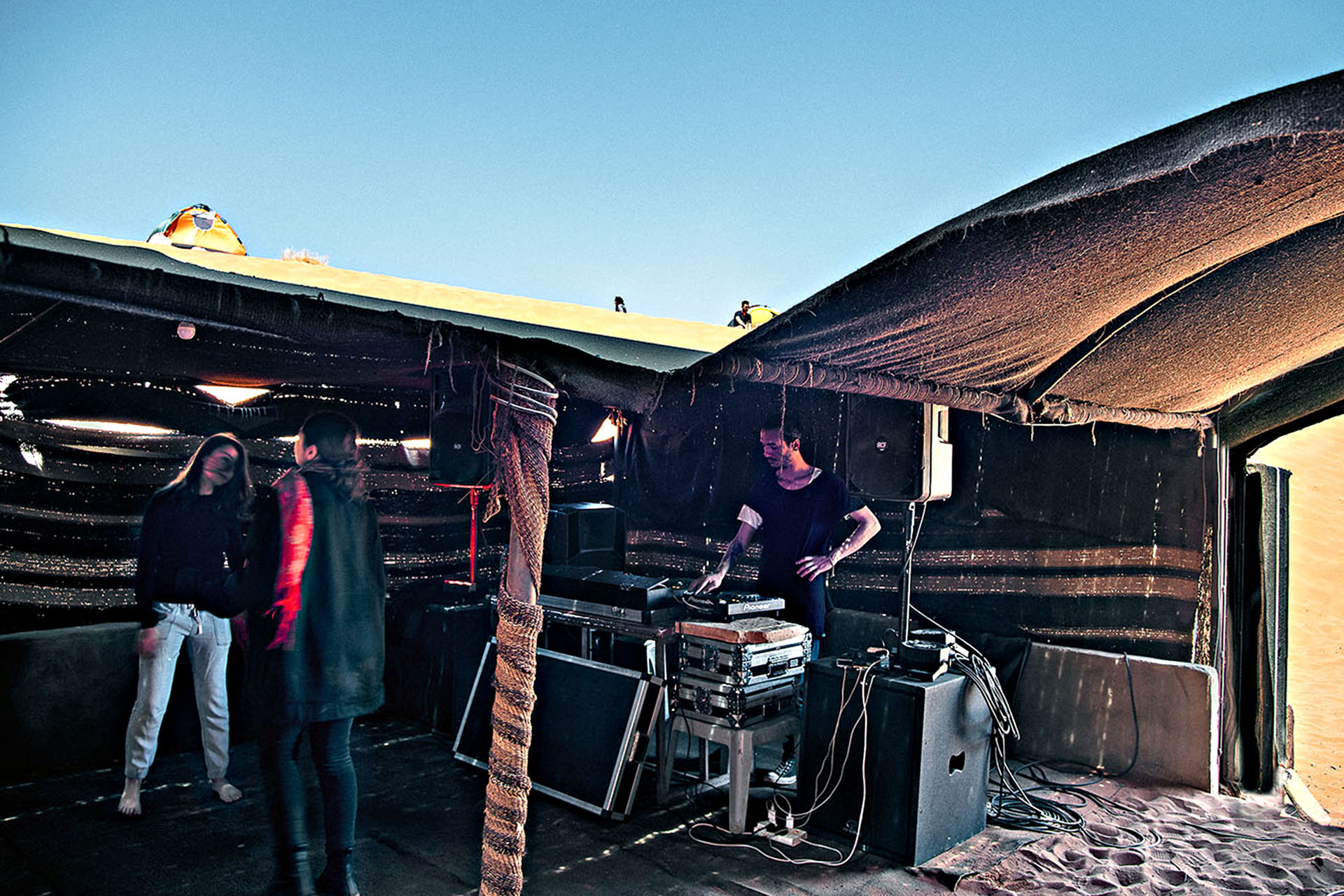 Bedouin tents offer shelter from the desert sun.