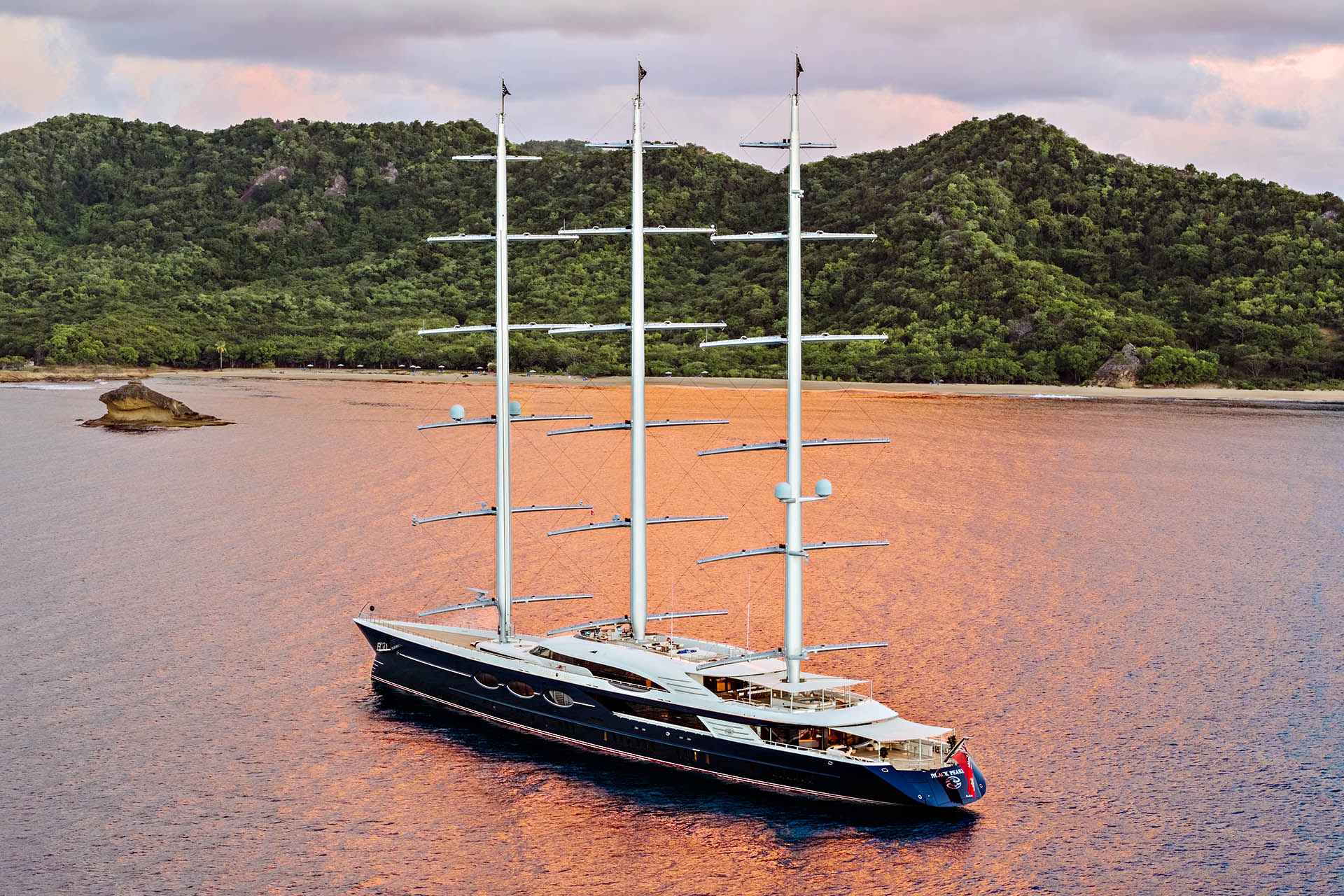 Luxury sailing yacht anchored off a secluded Greek island as part of the Cookson Adventures Odyssey experience.