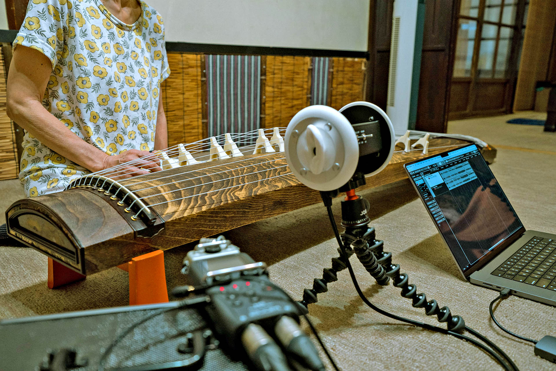 Recording traditional Japanese koto music for immersive travel soundscapes in Kyoto, Japan.