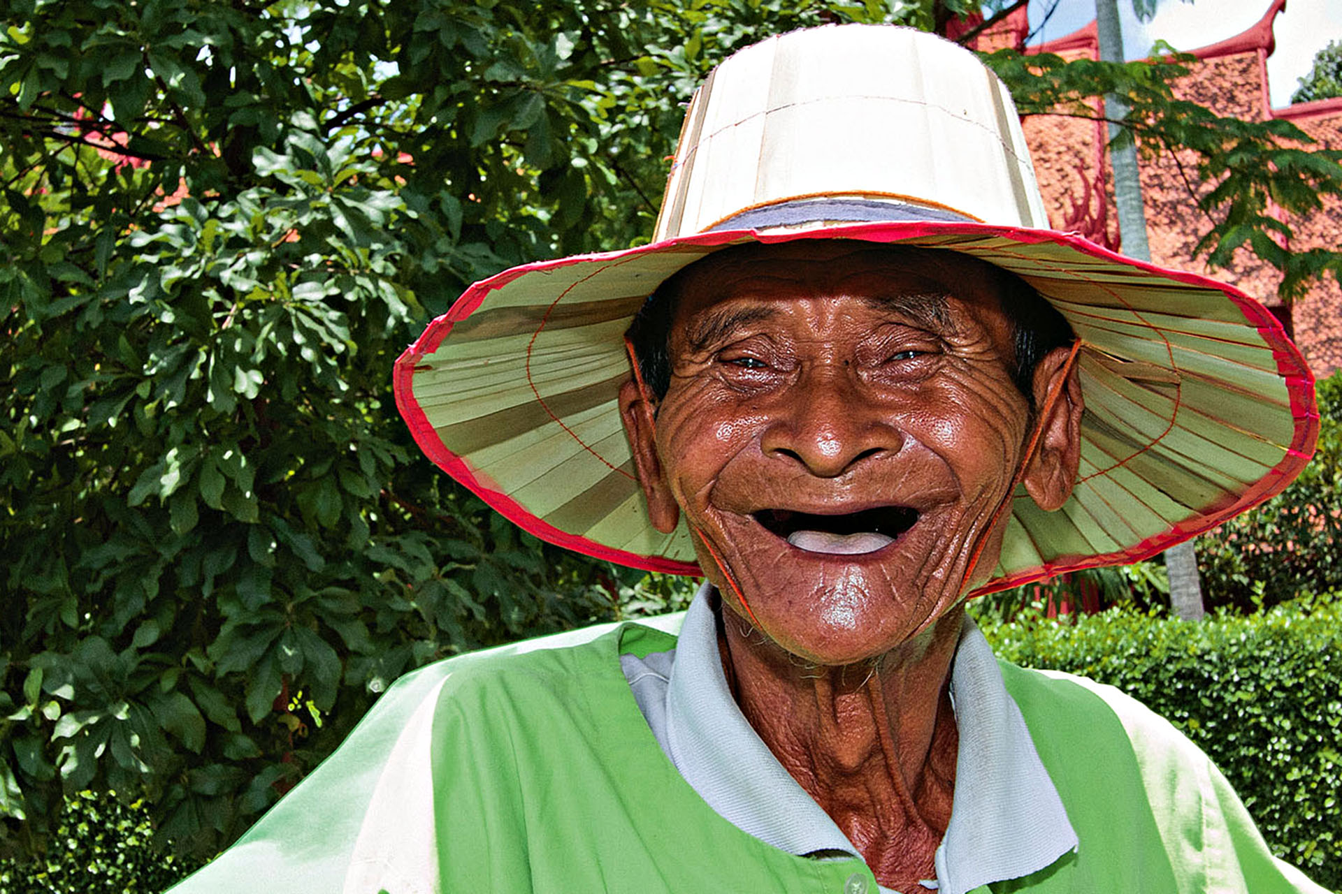 A happy cyclo rider in Phnom Penh.