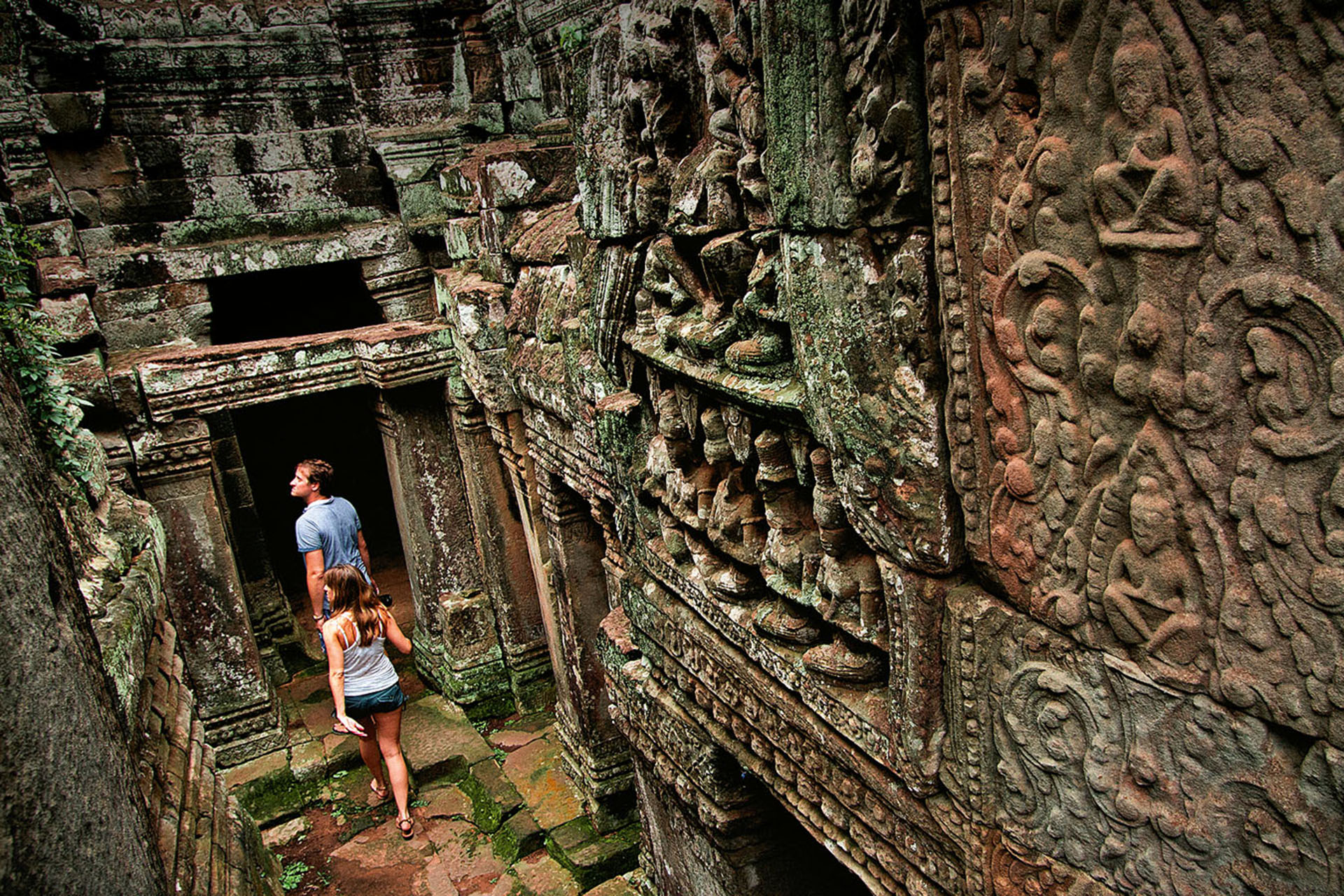 Exploring the ancient temple city of Angkor Thom.