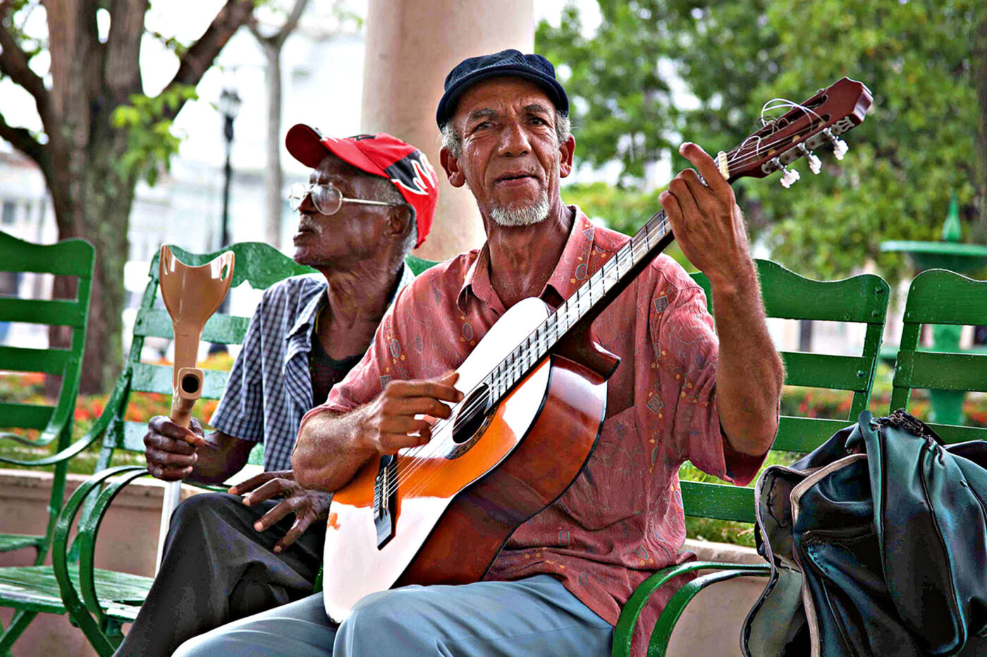 Two old-timers serenade us from beneath the bandstand in Parque José Martí, Cienfuegos.