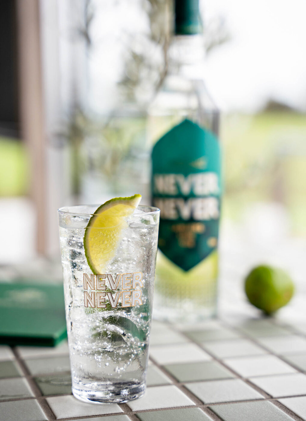 Never Never Landers Lime Gin and tonic with fresh lime at the new Landers Pocket distillery in Brisbane.
