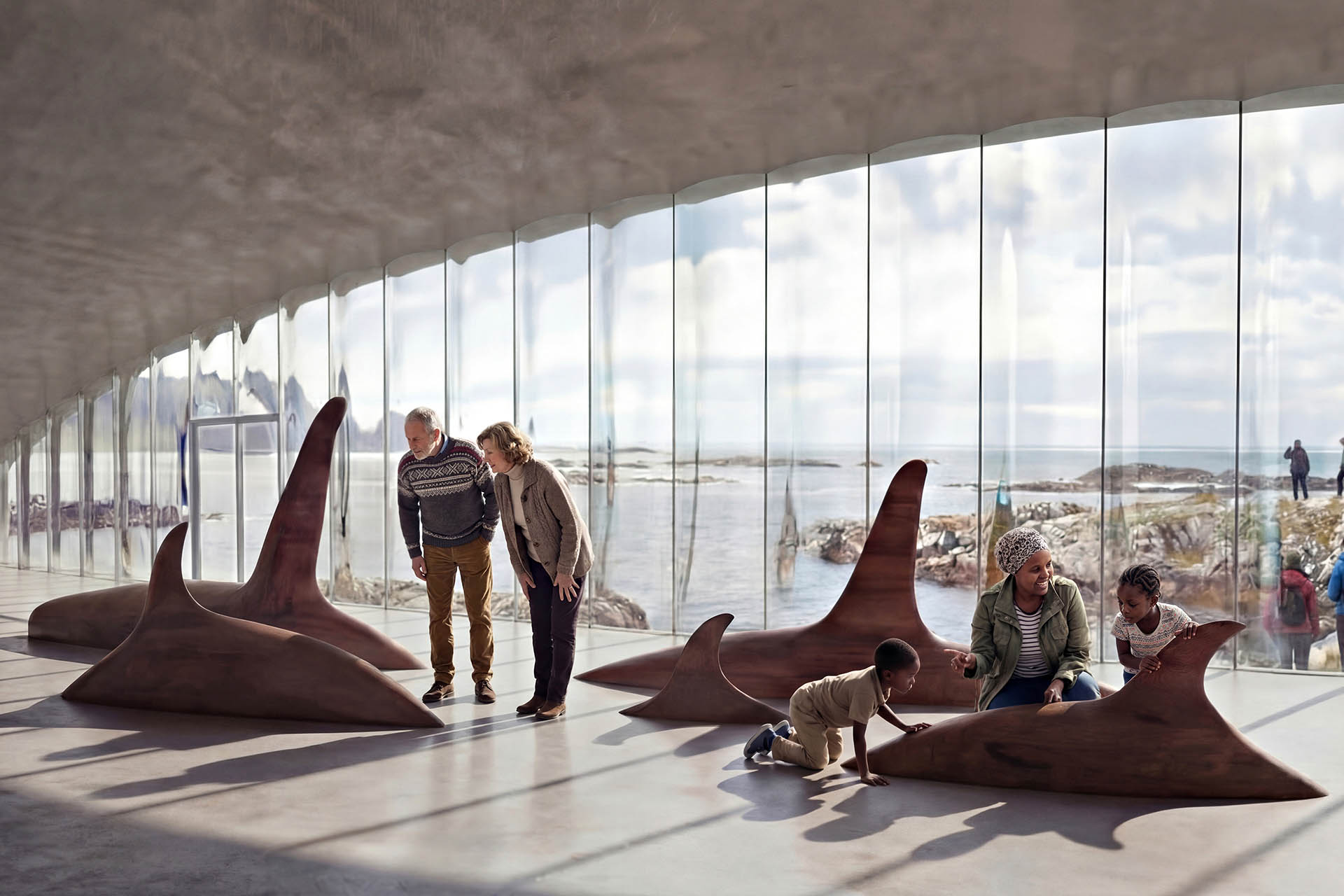Visitors explore whale-inspired exhibits inside The Whale museum in Andenes, Norway, with panoramic views across the Vesterålen coast.