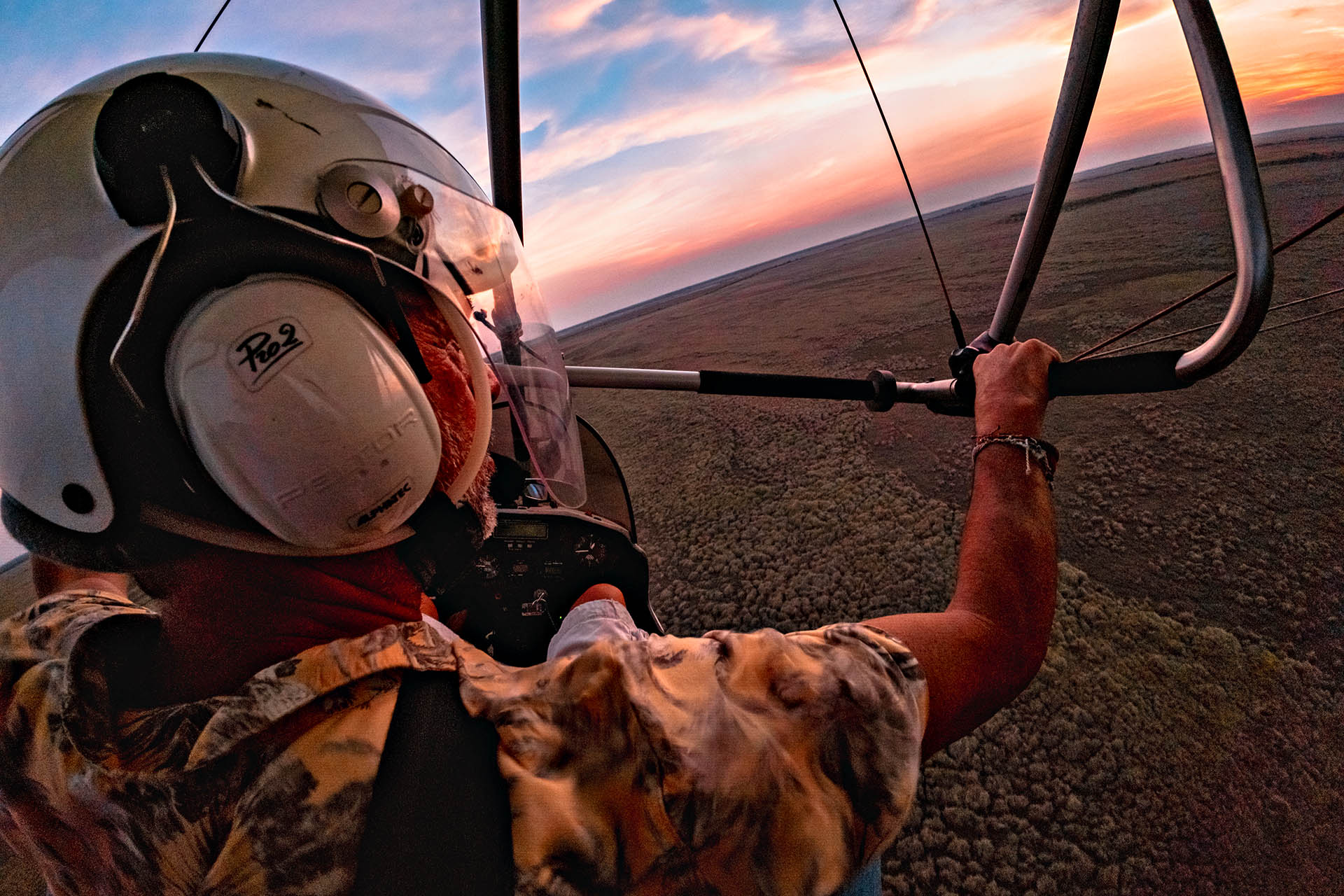 Microlight flight over vast Colombian wilderness at sunset during a Dr Jones adventure expedition.
