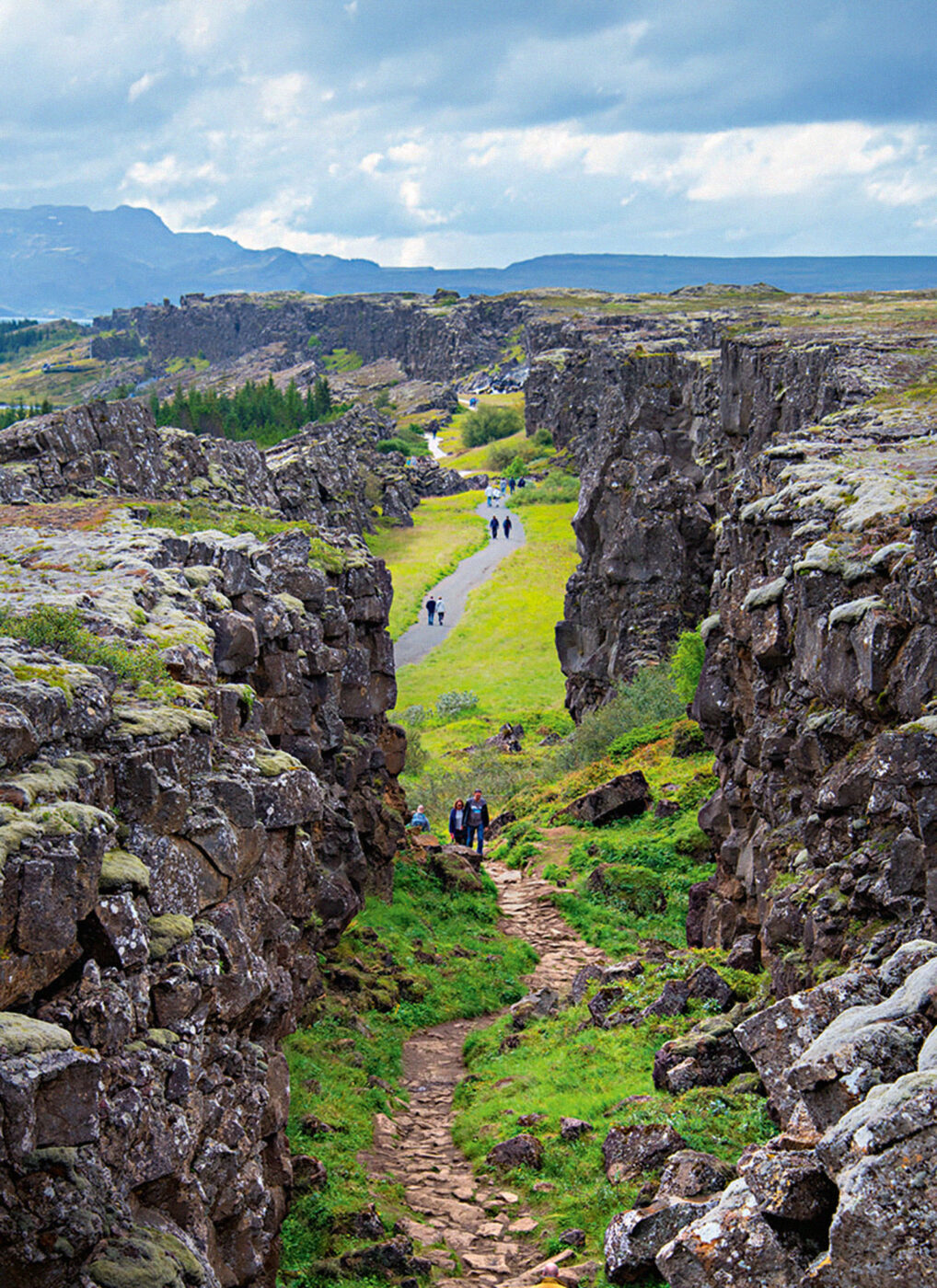 Walking through the unique landscape of Thingvellir National Park.
