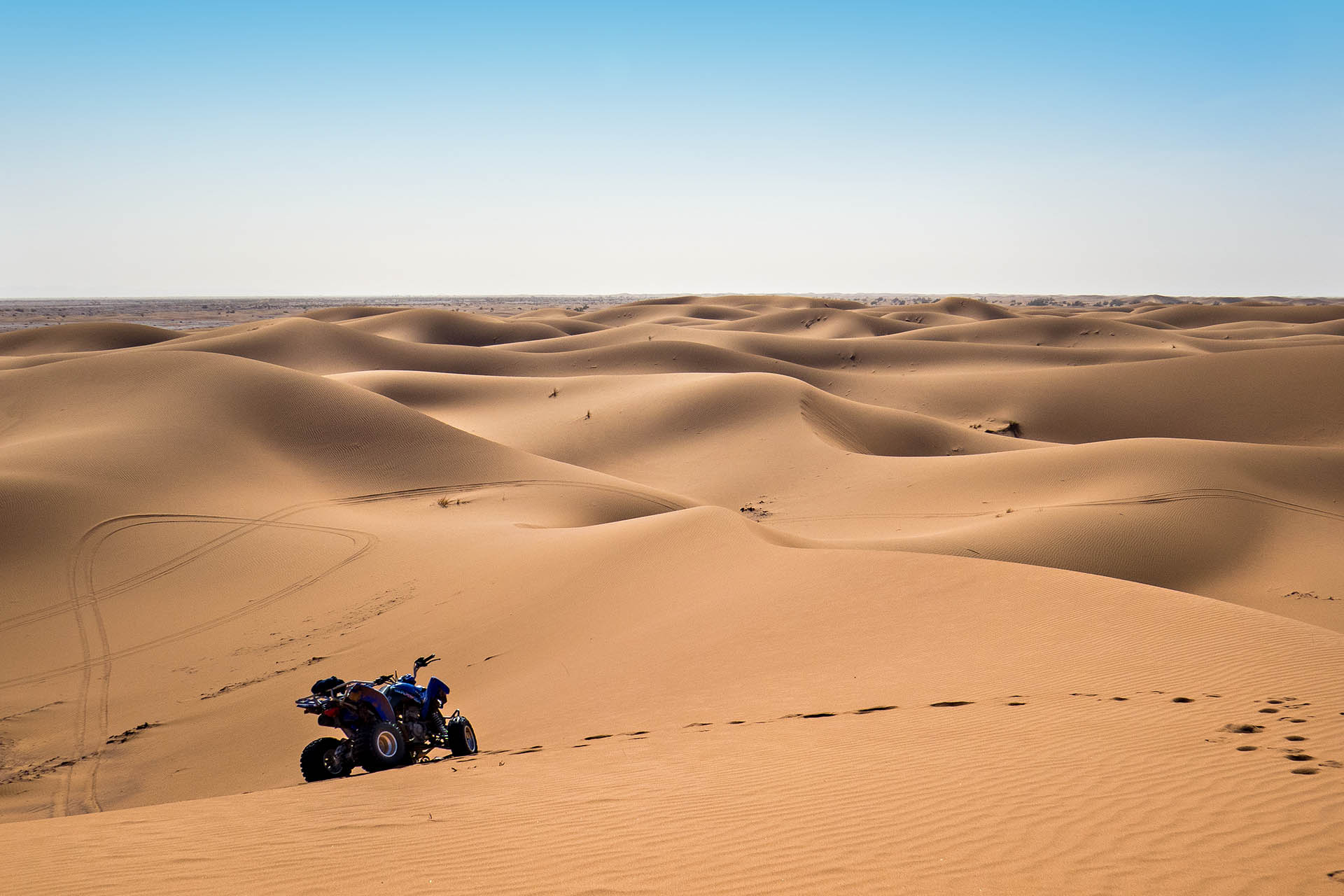 4 wheeler through the dunes