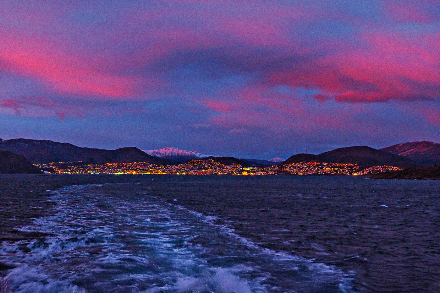 An early sunset paints the sky above Bodø.
