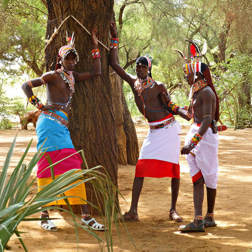 Samburu warriors stand by at Elephant Watch Camp.