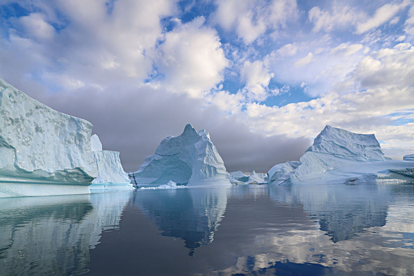 The shapes of the icebergs create a sculpture-like landscape in Greenland.