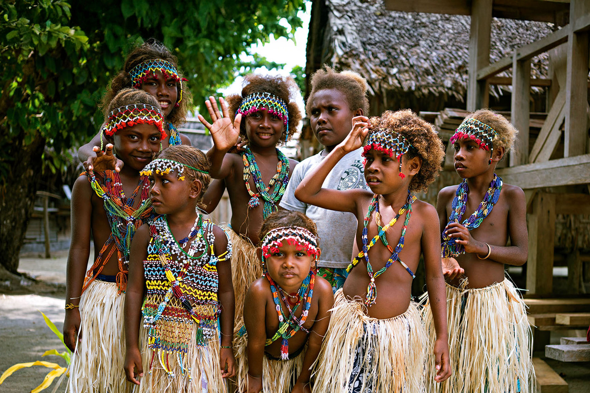 Children of all ages dress in traditional garb and participate in the welcome performances when tourists visit.
