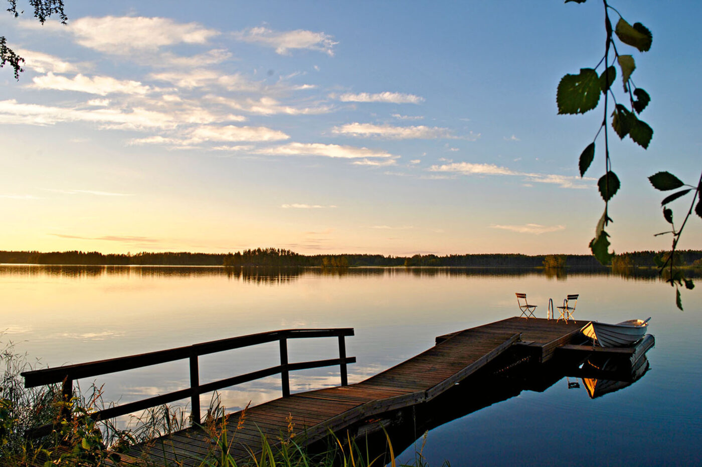 A private jetty and rowboat at Oravi Village.