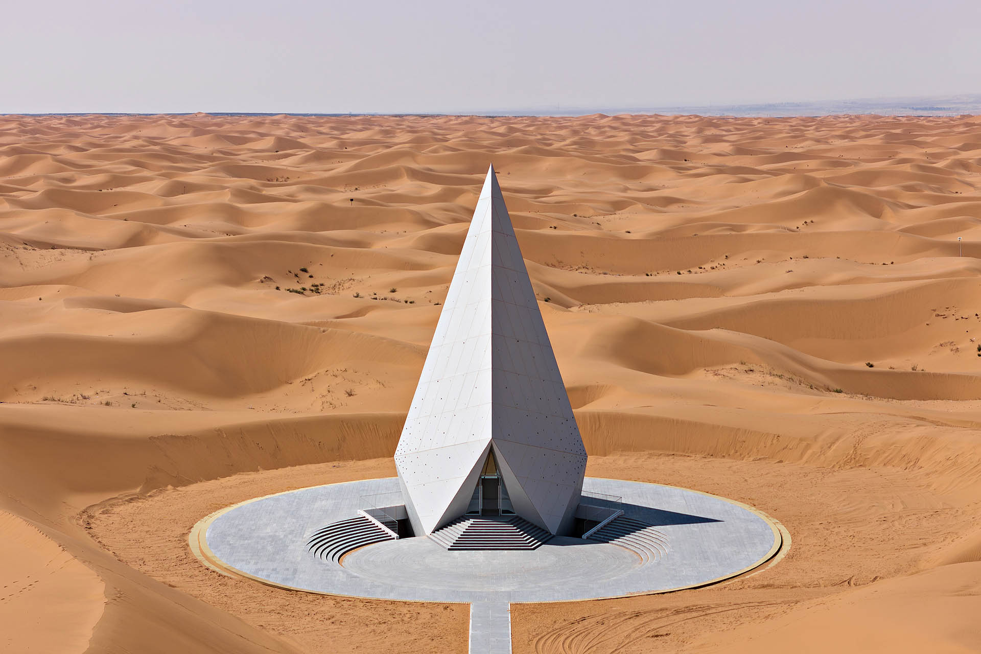 Diamond-shaped Star Hall rising from the sand dunes at ZhongWei Desert Diamond Hotel in China’s Tengger Desert.