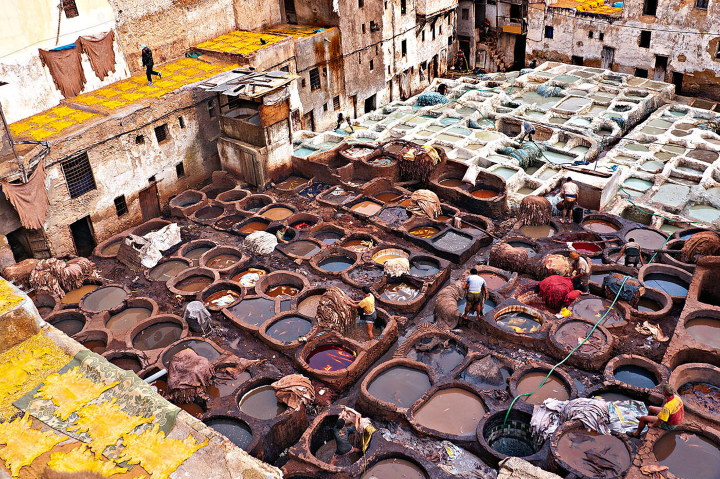 Lots of different people using tanning baths.