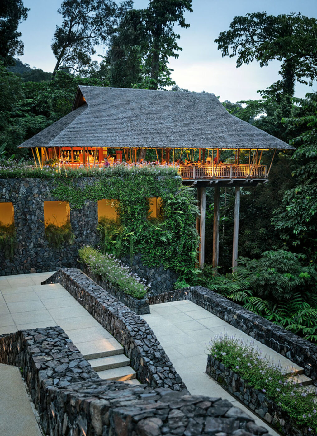 The Pavilion sits on stilts above the forest canopy.