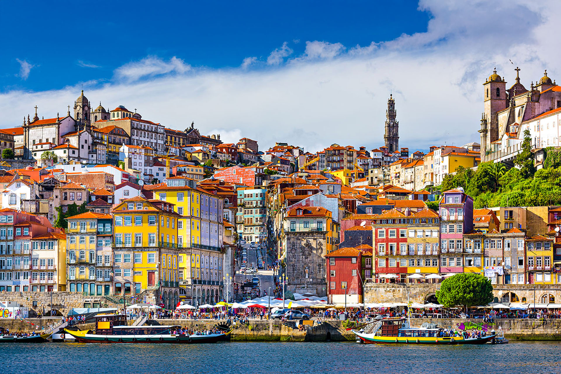 A colourful town by the water.