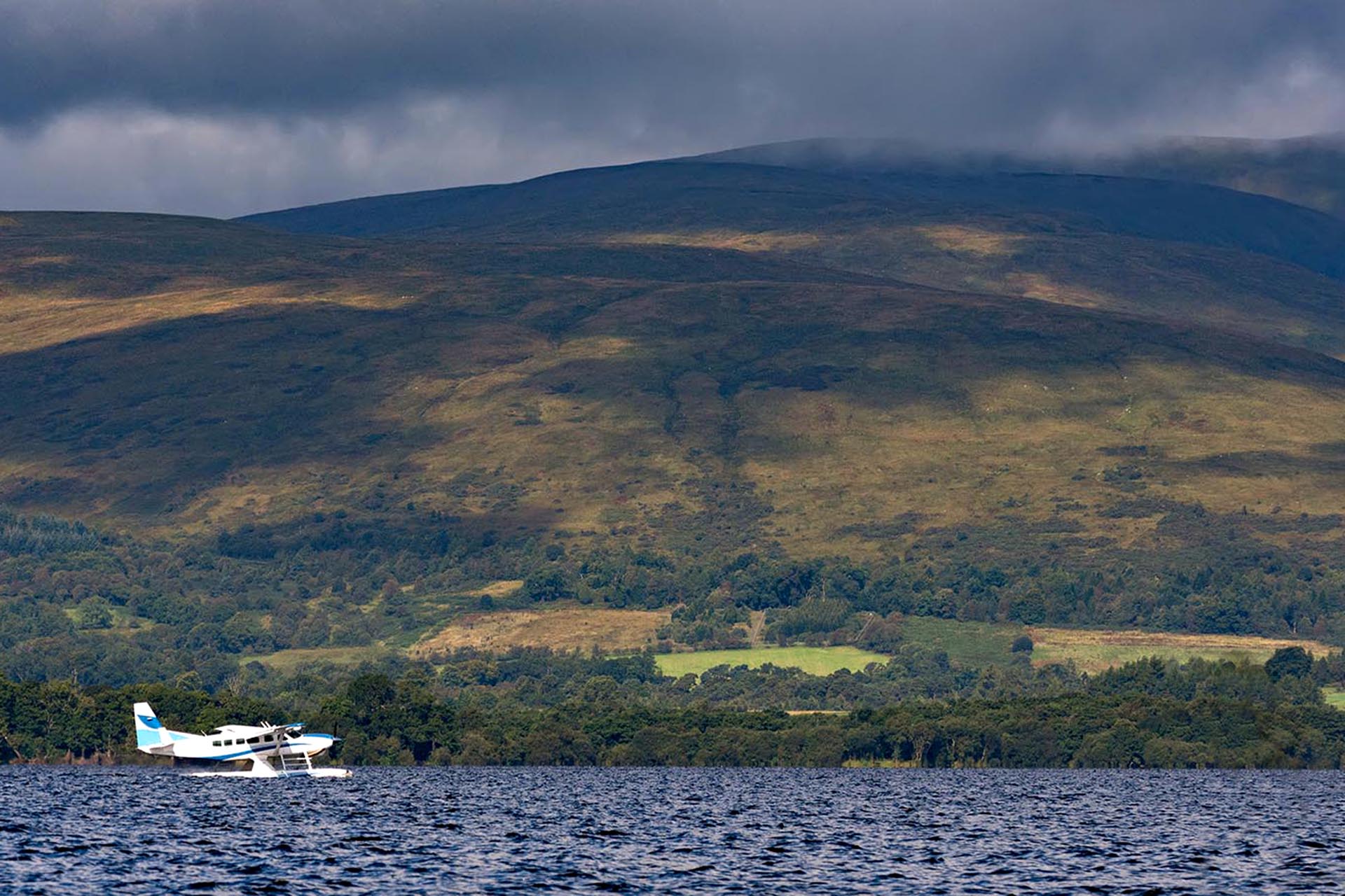 A small plane gliding over the water.