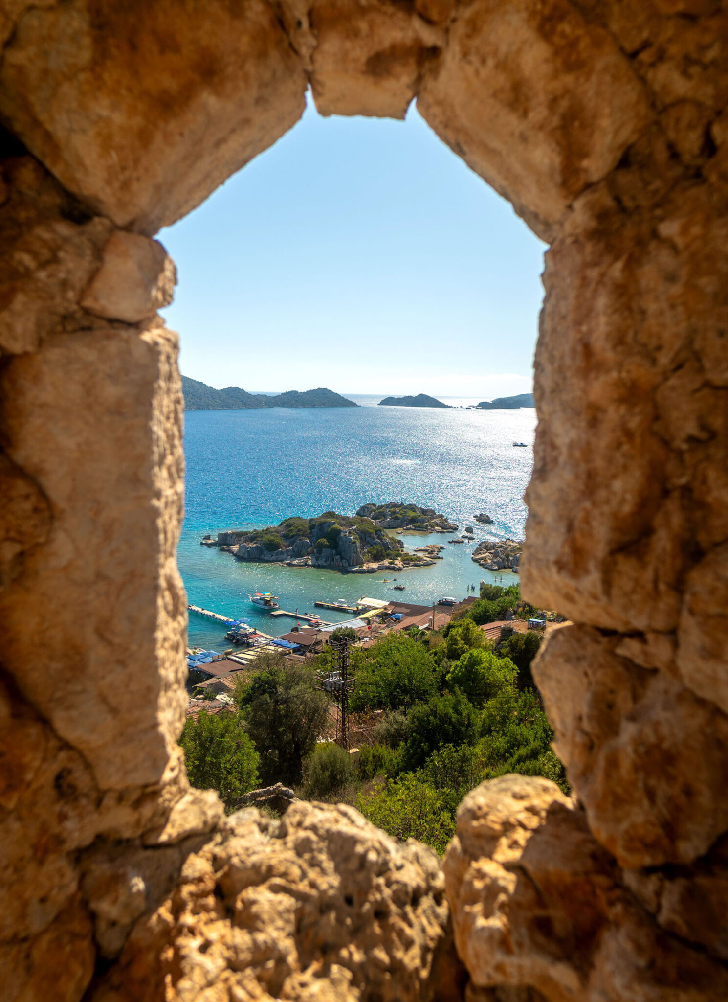 View from the ancient Simena Castle, overlooking the turquoise coastline.