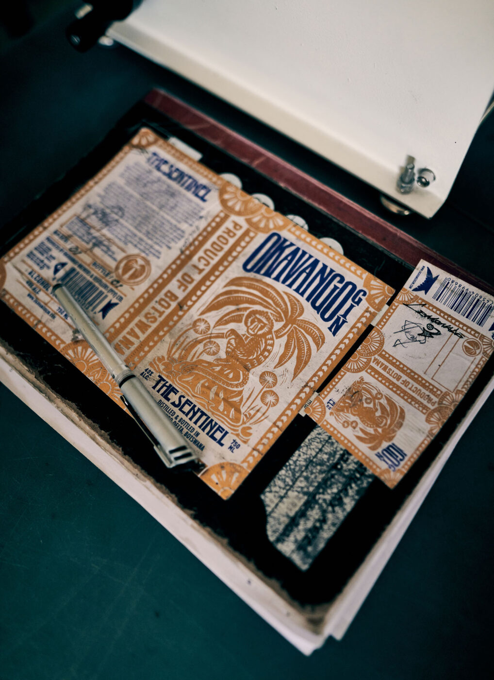 Okavango Gin bottle labels at the Botswana distillery.