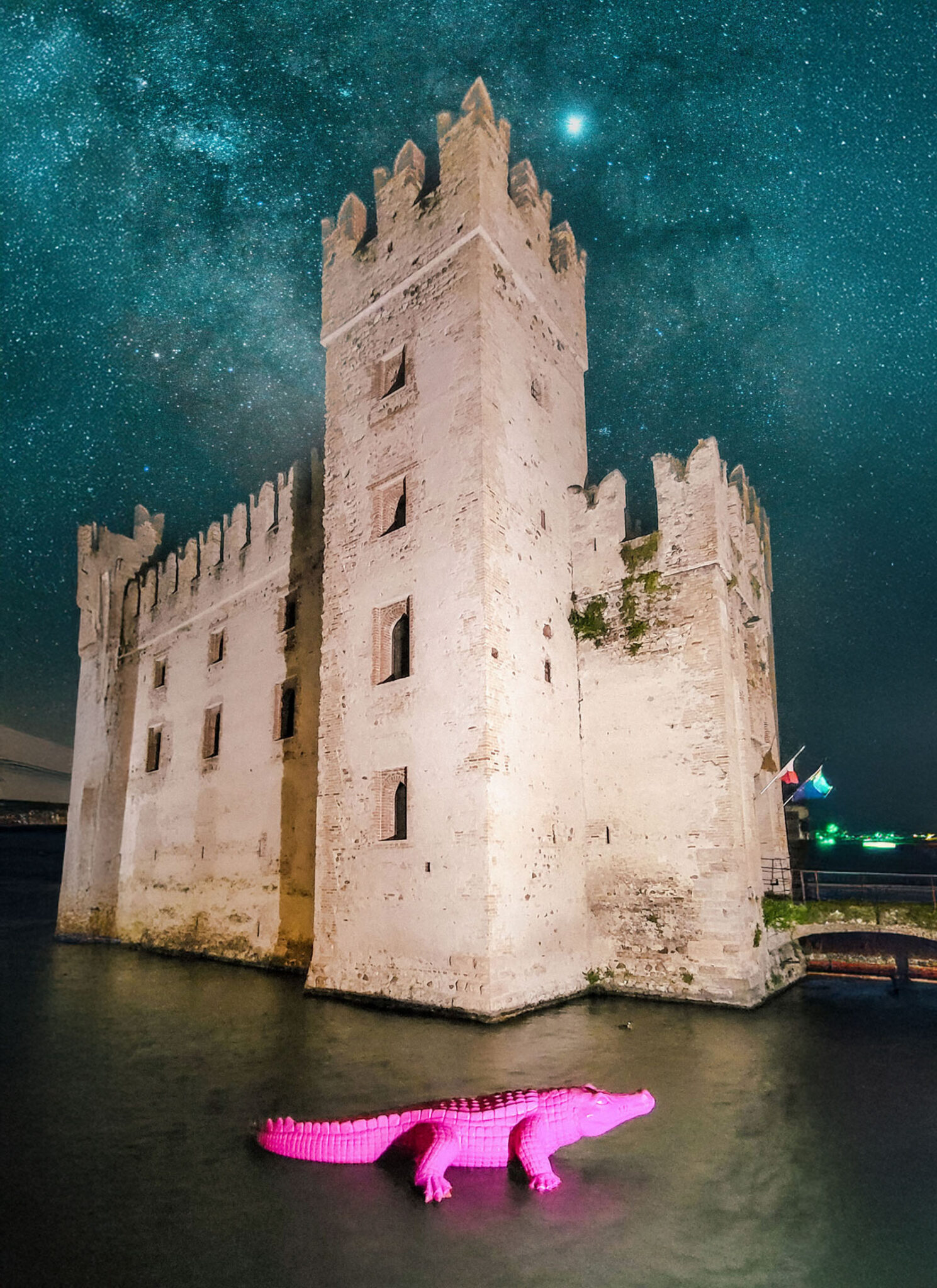 The moat of the Scaligero Castle in Sirmione feels like an AI fantasy.